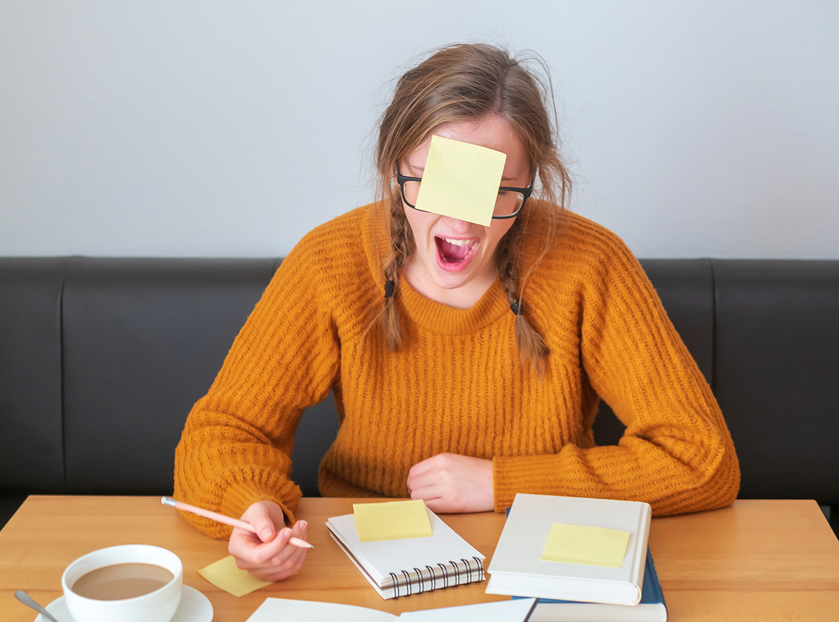 female student with sticky note